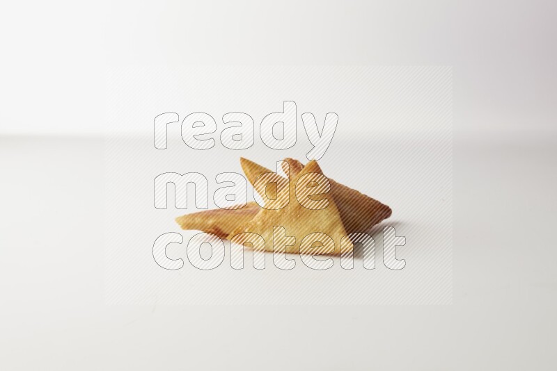 sambosas on a white background