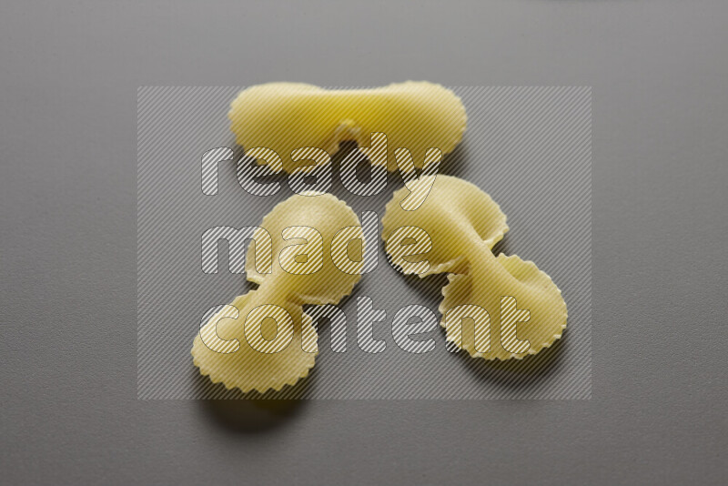 Fiocchi pasta on grey background