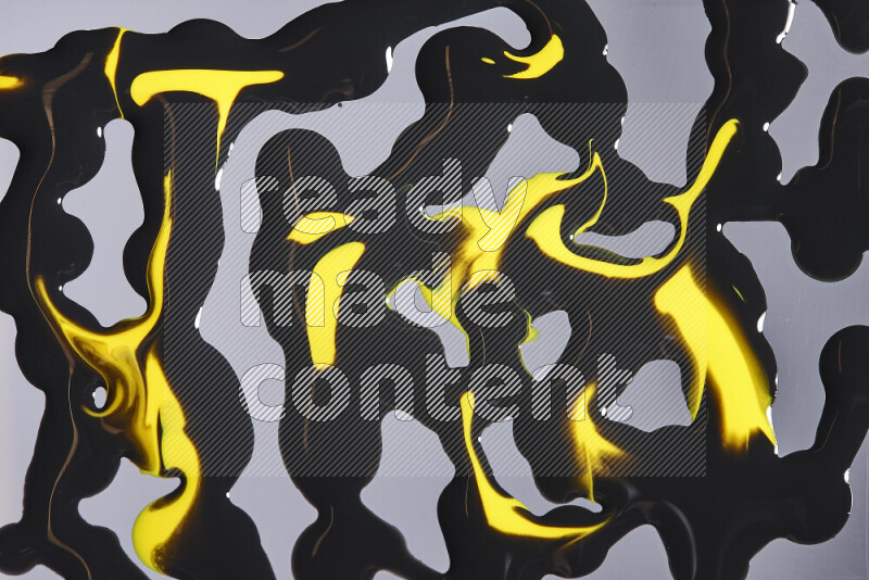 Abstract colorful background with mixed of yellow and black paint colors