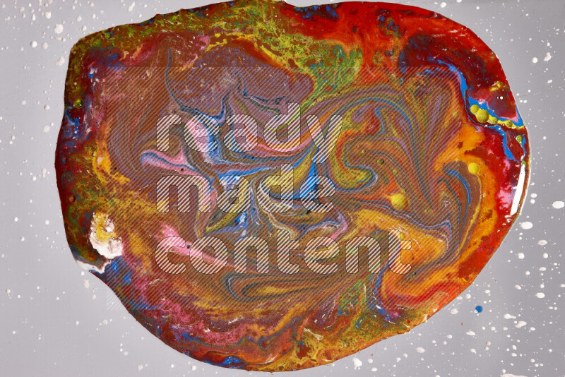 Close-ups of assorted colors blending on a grey background