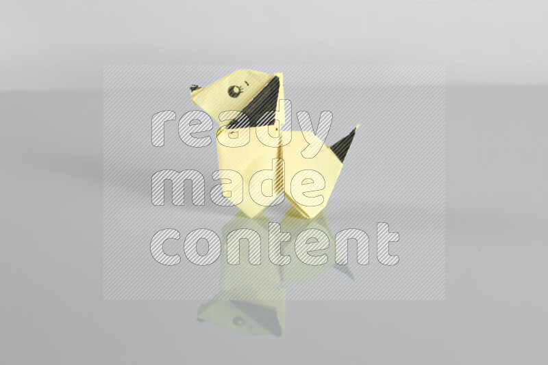 Origami animals on grey background
