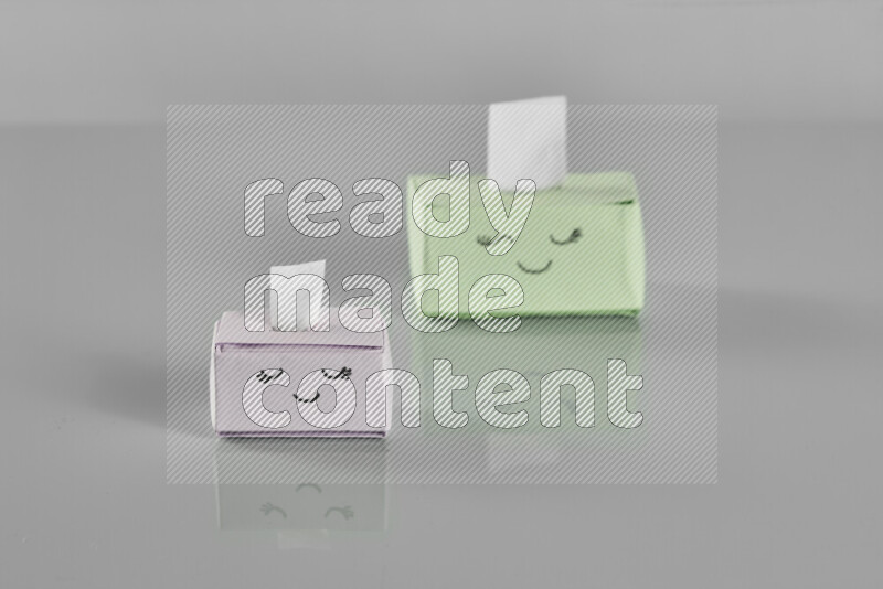 Origami tissue box on grey background