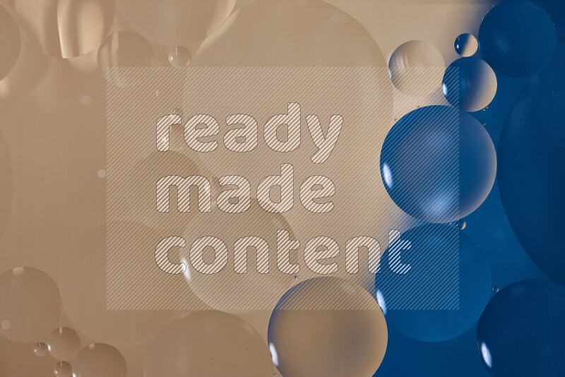Close-ups of abstract oil bubbles on water surface in shades of blue and brown