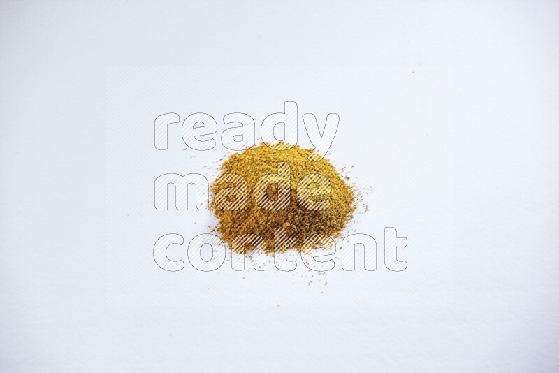 Turmeric powder on white flooring