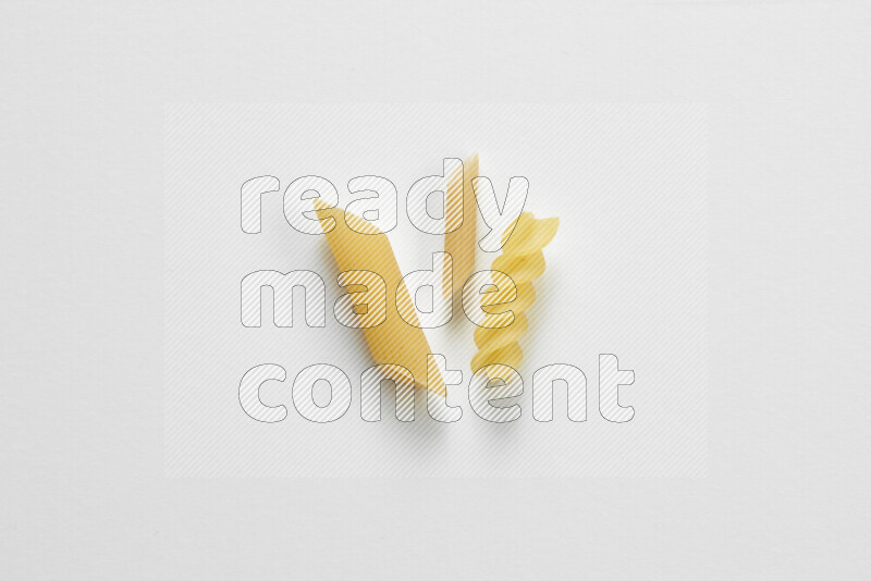 Different pasta types on white background