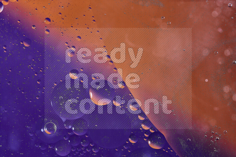 Close-ups of abstract oil bubbles on water surface in shades of orange and purple