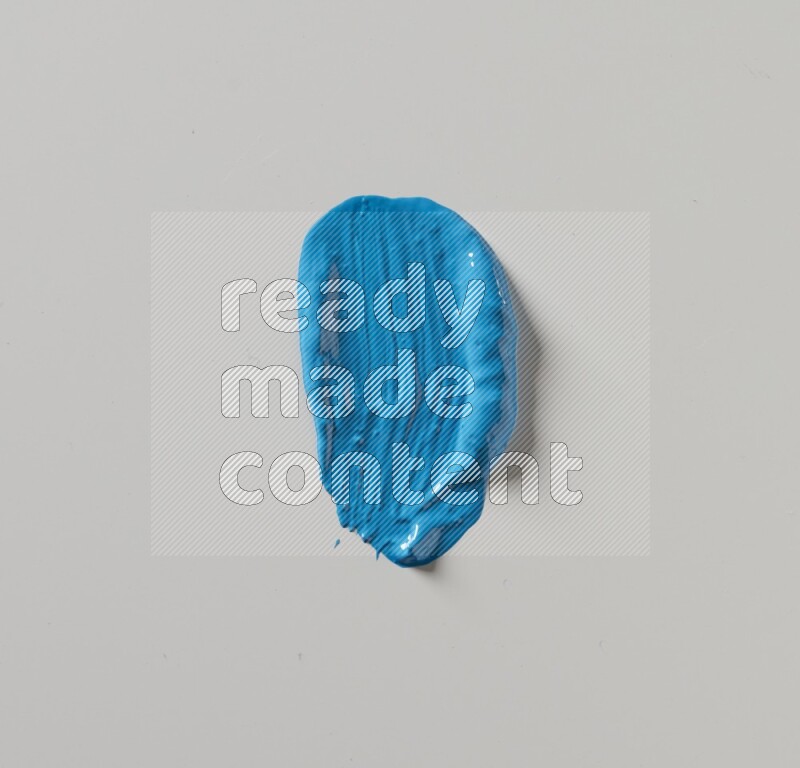 A single blue straight line brush stroke on a white background