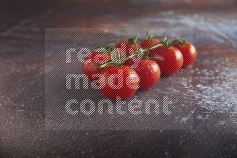 red cherry tomato vein on a reddish rustic metal background 45 degree