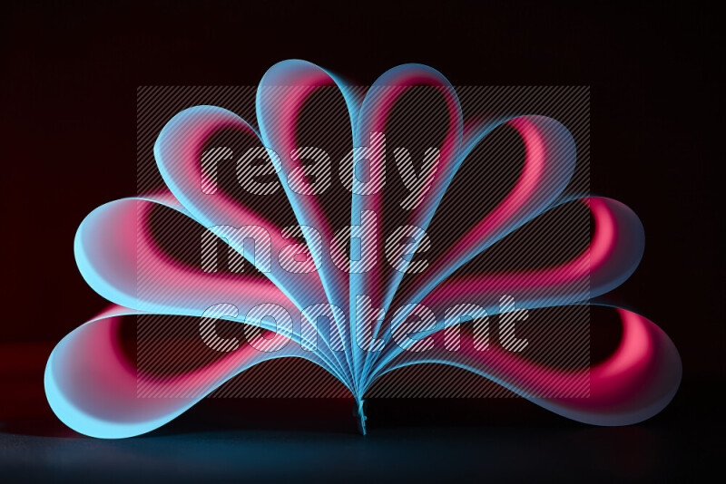 An abstract art piece displaying smooth curves in blue and red gradients created by colored light