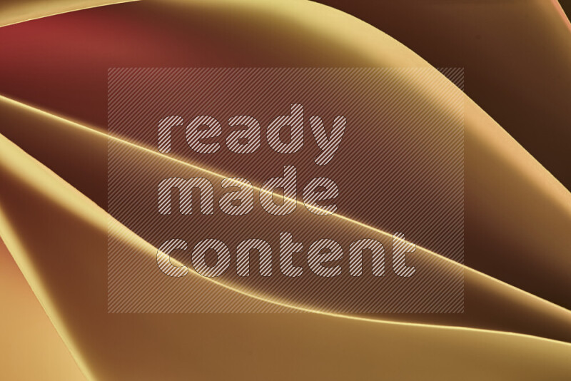 This image showcases an abstract paper art composition with paper curves in yellow, red and brown gradients created by colored light