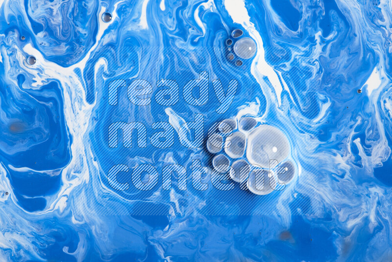 Abstract colorful background with mixed of white and blue paint colors