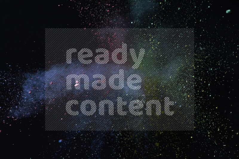 Colorful powder explosion on black background