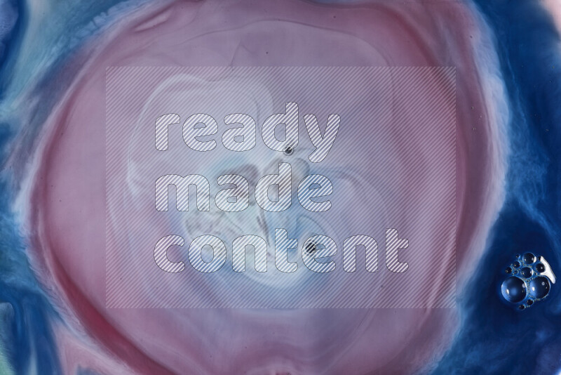 لقطة مقربة لأنماط دوامية باللون الأزرق والأحمر والأبيض