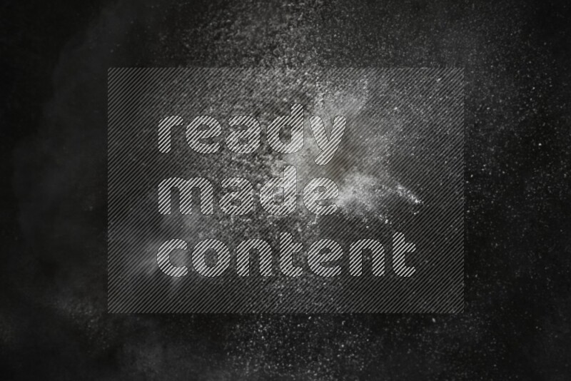 White powder explosion on black background