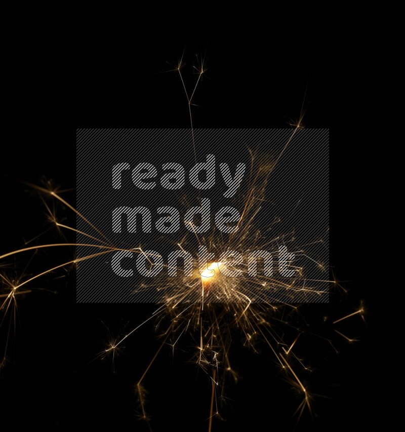 Sparkler candle isolated on black background