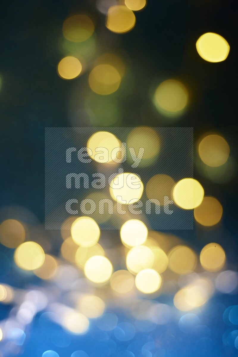 Bokeh light in yellow with blue background
