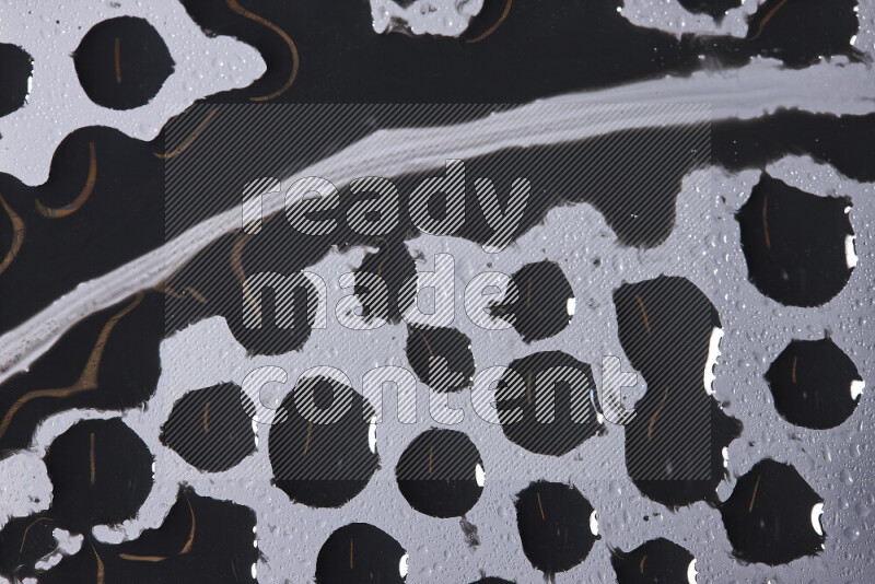 Close-ups of abstract black paint texture in different shapes