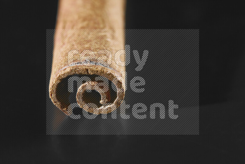 Cinnamon sticks on black background