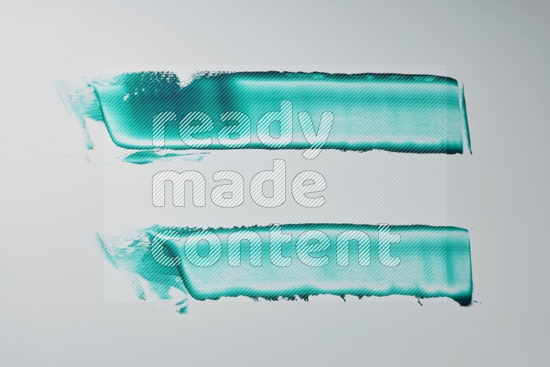 Turquoise painting knife strokes on white background