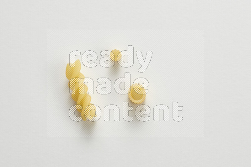 Different pasta types on white background