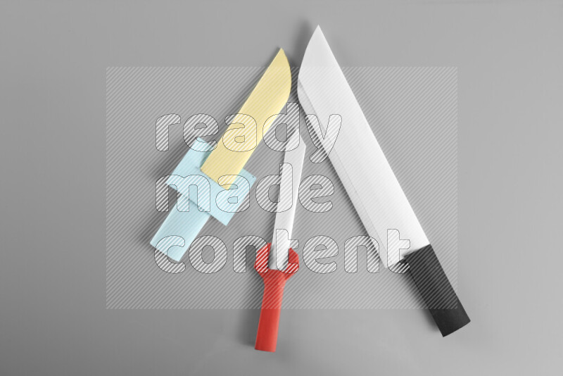 Origami sword on grey background