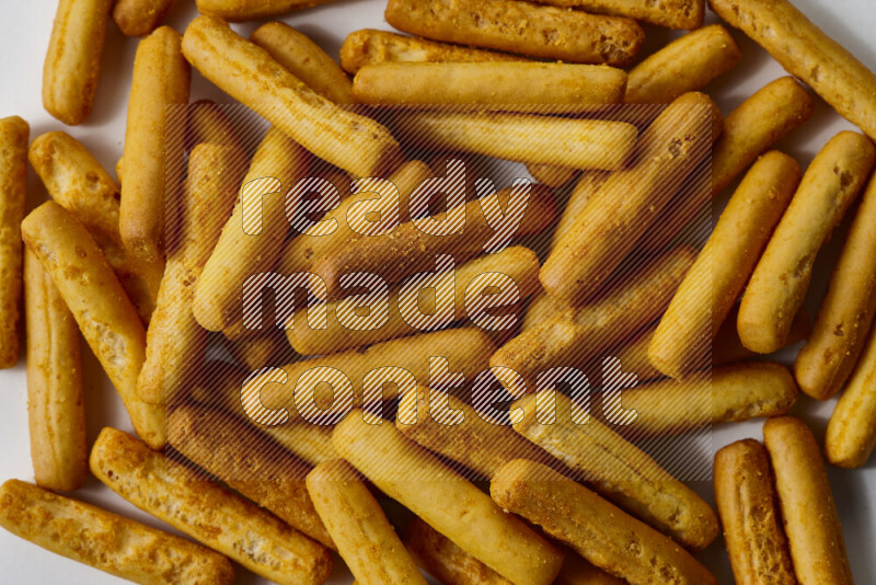 Assorted snacks on white background