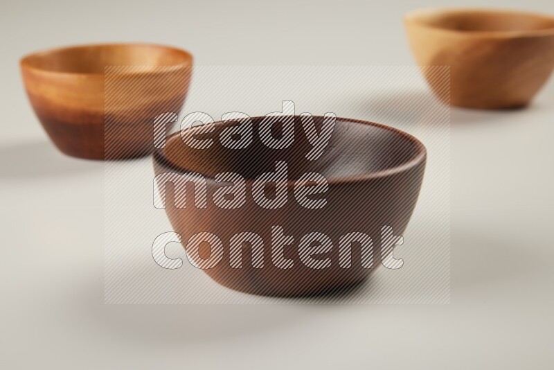 Wooden bowl on white background