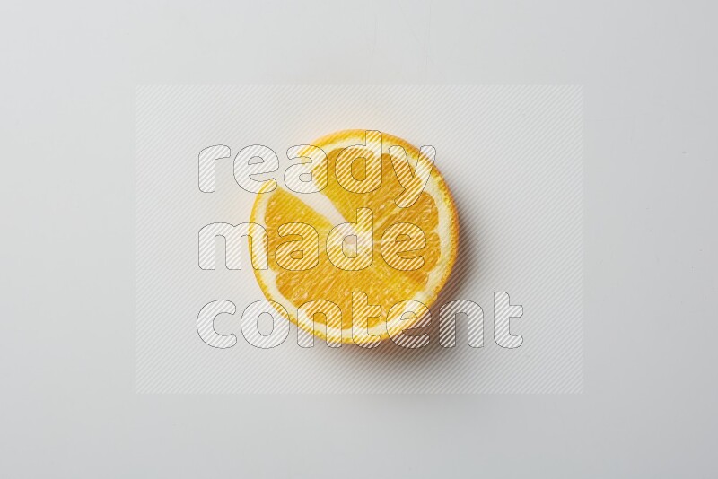 Two halves of an orange slices on white background