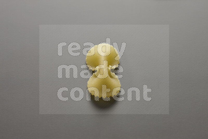 Fiocchi pasta on grey background