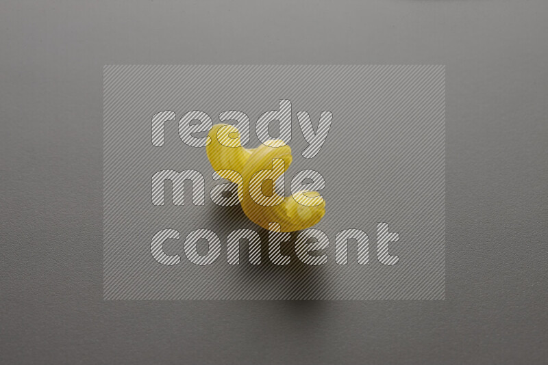 Twist pasta on grey background