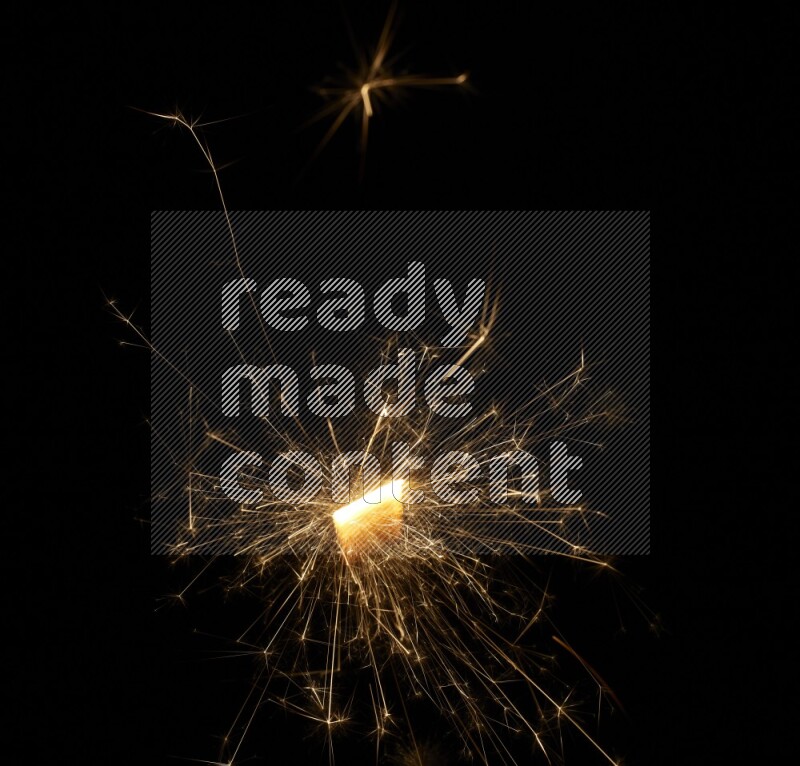 Sparkler candle isolated on black background