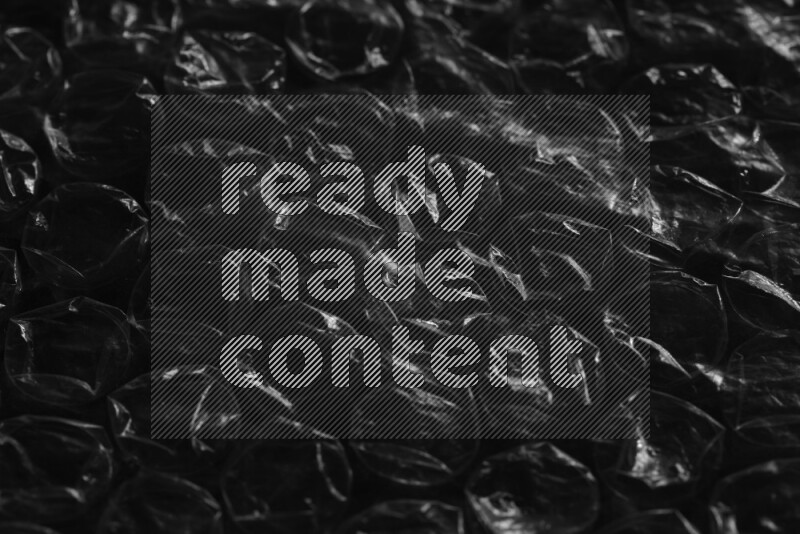 Bubble wrap texture on black background