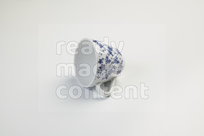 white and blue mug on white background