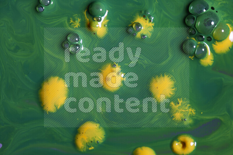 Abstract colorful background with mixed of green and yellow paint colors