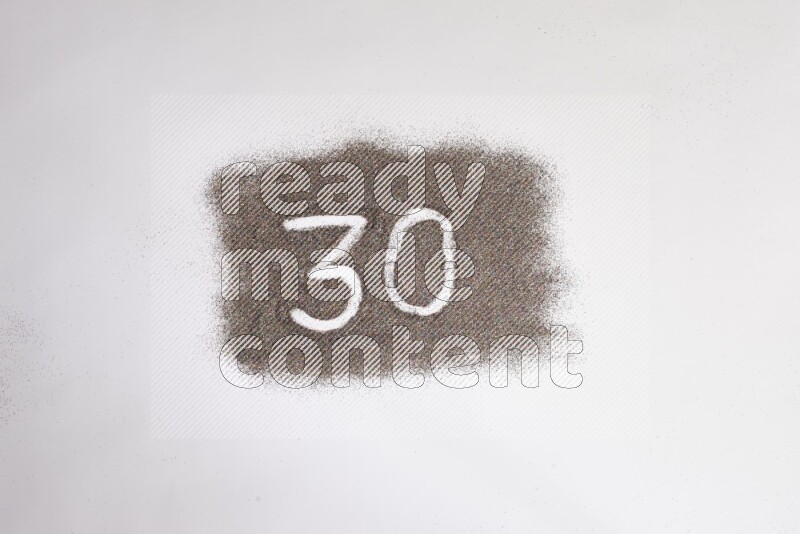 Numbers written with glitter on white background