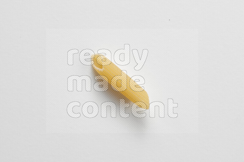 Penne pasta on white background