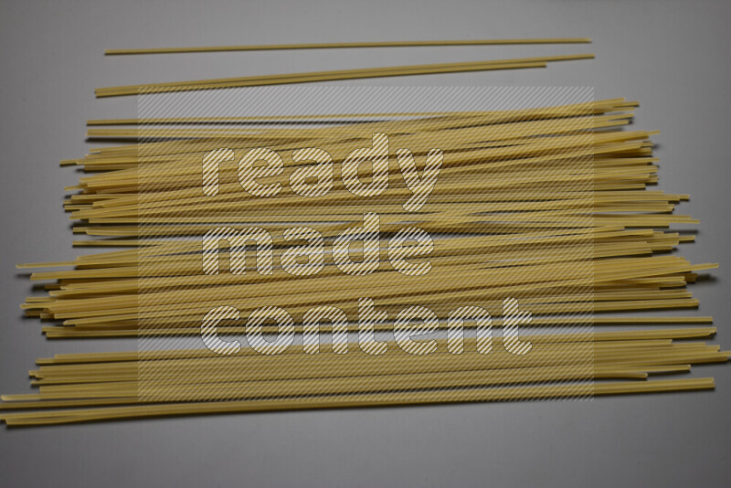 Spaghetti pasta on grey background