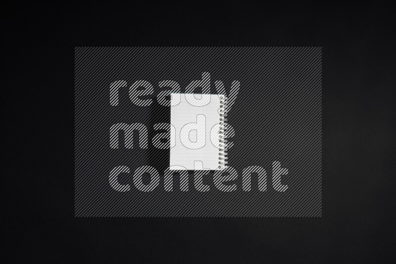 Notebook sheet on black background