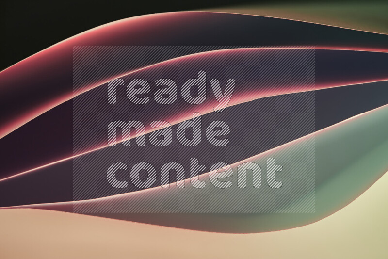 This image showcases an abstract paper art composition with paper curves in green and red gradients created by colored light