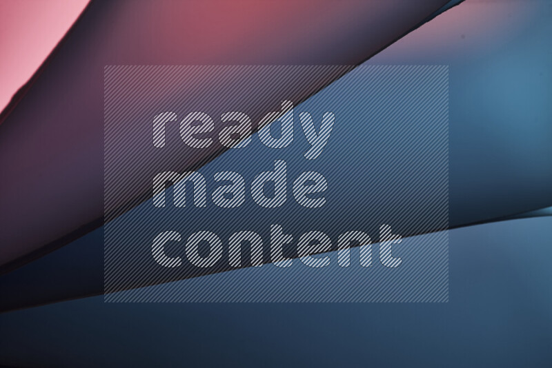 An abstract art piece displaying smooth curves in warm and cold gradients created by colored light