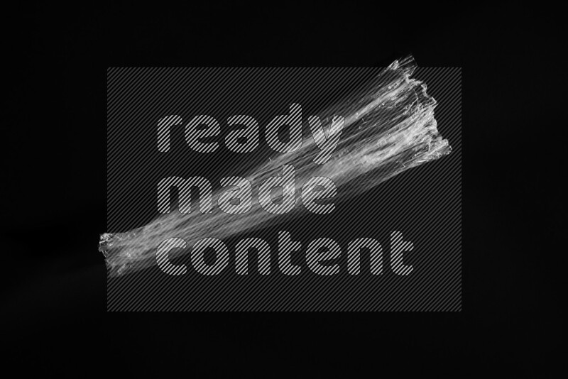 Transparent plastic textures on black background