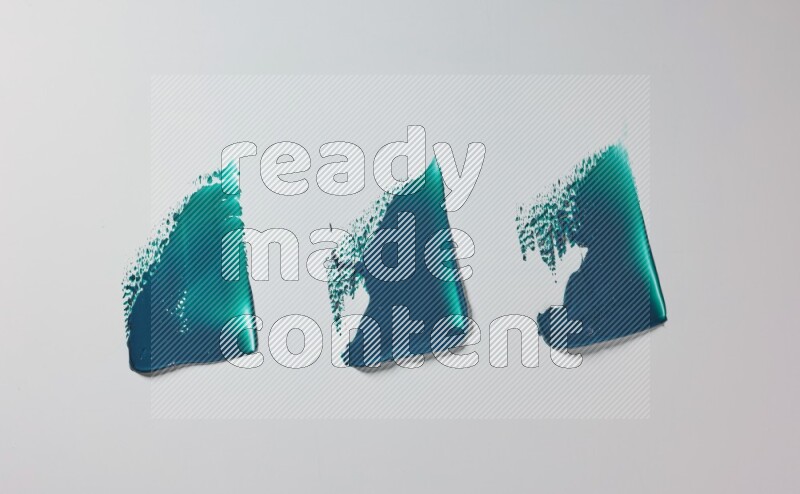 Turquoise painting knife strokes in on white background