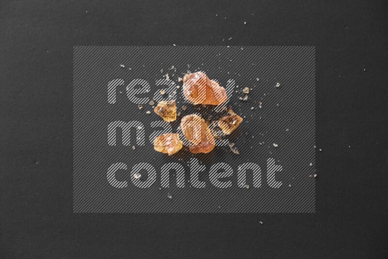 Gum arabic on a black flooring
