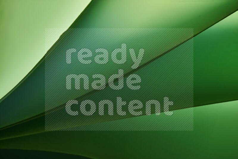 فن تجريدي يعرض منحنيات مع تدرجات الألوان الباردة مكونه بضوء ملون