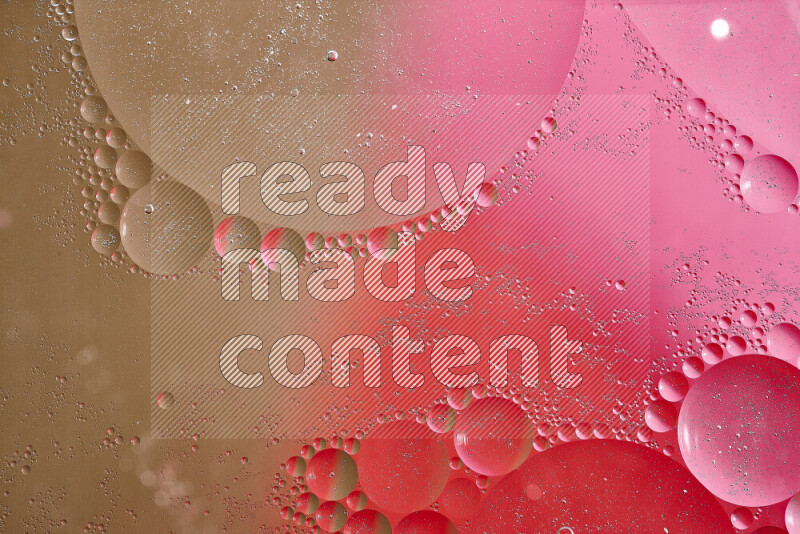 Close-ups of abstract oil bubbles on water surface in shades of brown, red and pink