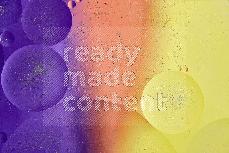 Close-ups of abstract oil bubbles on water surface in shades of yellow, orange and purple