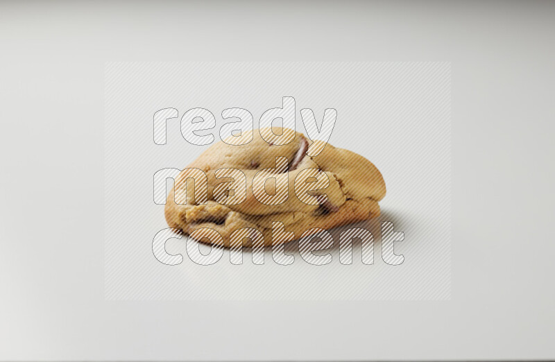 a chocolate chip cookie on a white background