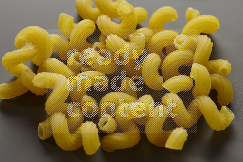 Twist pasta on grey background