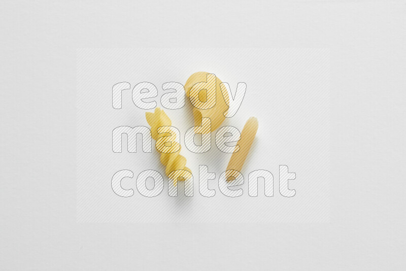 Different pasta types on white background