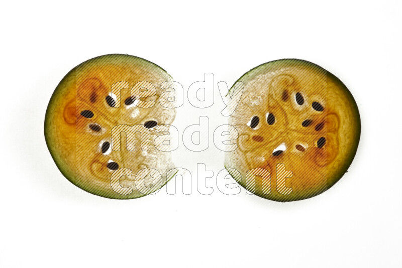 Watermelon slices on illuminated white background